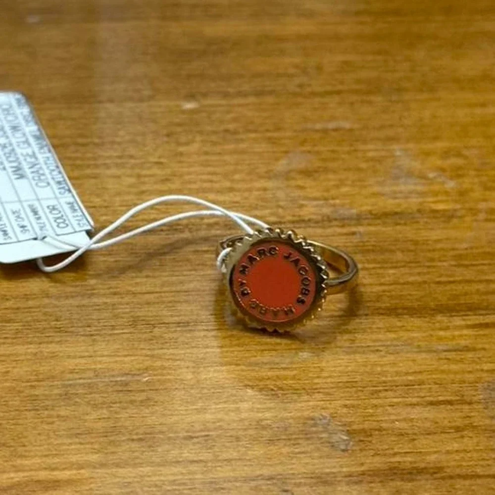 Marc‎ Jacobs gold tone ring with red accents
